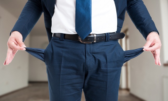 Closeup,Of,Male,Realtor,Showing,His,Empty,Suit,Pockets,As