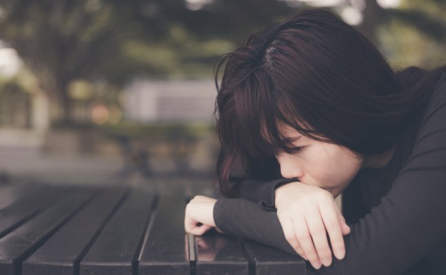 Asian,Woman,Sitting,Alone,And,Depressed,portrait,Of,Tired,Young,Woman.