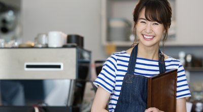 Cheerful,Asian,Waitress,In,Cafe.