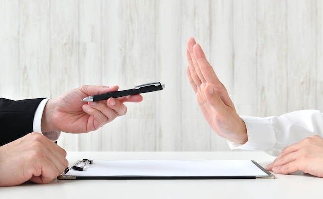 Business,Man’s,Hand,Recommending,Contract,And,Customer’s,Hand,Refusing,It