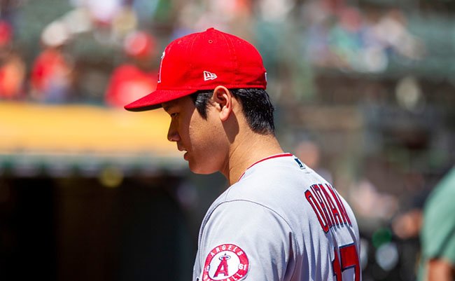 Oakland, California - August 10, 2022: Los Angeles Angels DH Shohei Ohtani walks on the field before a game against the Oakland Athletics at the Oakland Coliseum.