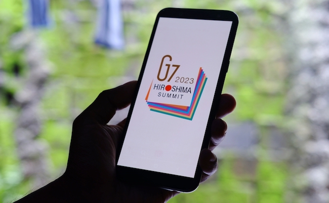 Jakarta, January 04,2023: The 49th G7 summit logo displayed on smartphone. The conference will take place from May 19th -21st 2023 in Hiroshima, Japan. "G7" for " Group of Seven". G7 logo