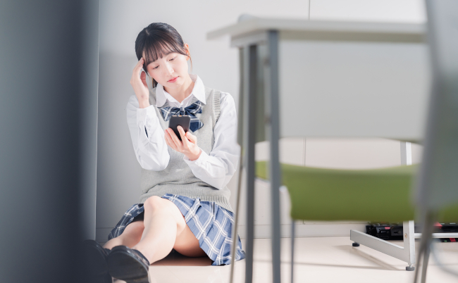 A,High,School,Girl,Who,Is,Depressed,While,Looking,At