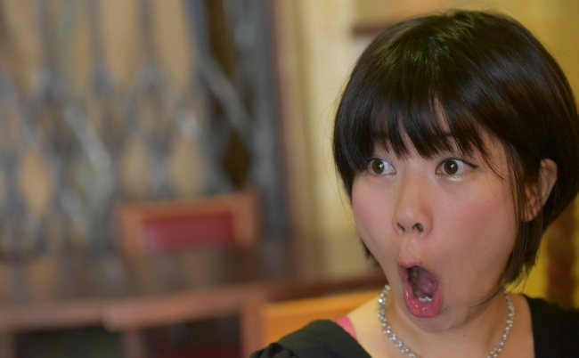 A,Asian,Lady,Surprised