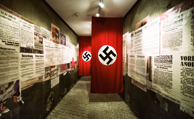 KRAKOW, POLAND - FEBRUARY 19: Swastika - flag in Oskar Schindler's Enamel factory museum on February 19, 2018 in Krakow