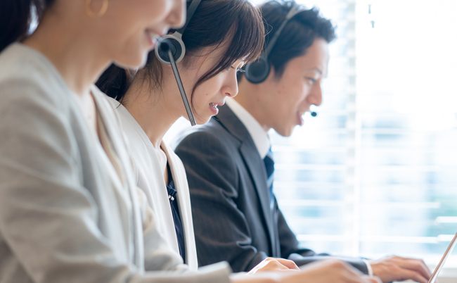 Asian,Operator,Working,In,Office