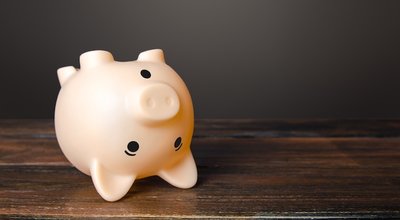 Surprised upside down piggy bank. Stunning interest rates on deposits. Savings. Opportunities and prospects. High income and earnings. Discounts and sale. Favorable offers, advertising. Benefit