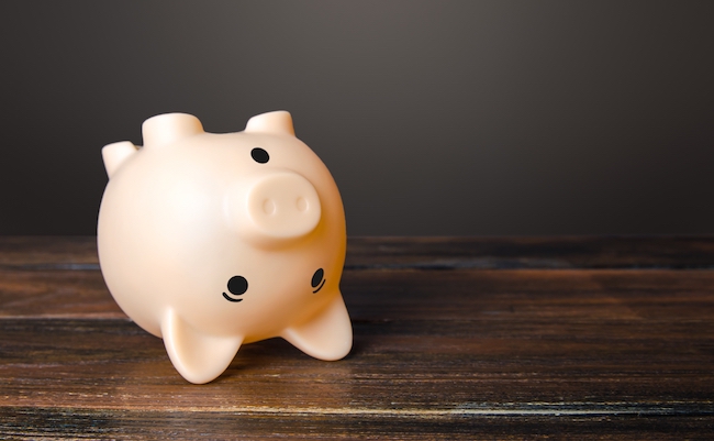 Surprised upside down piggy bank. Stunning interest rates on deposits. Savings. Opportunities and prospects. High income and earnings. Discounts and sale. Favorable offers, advertising. Benefit