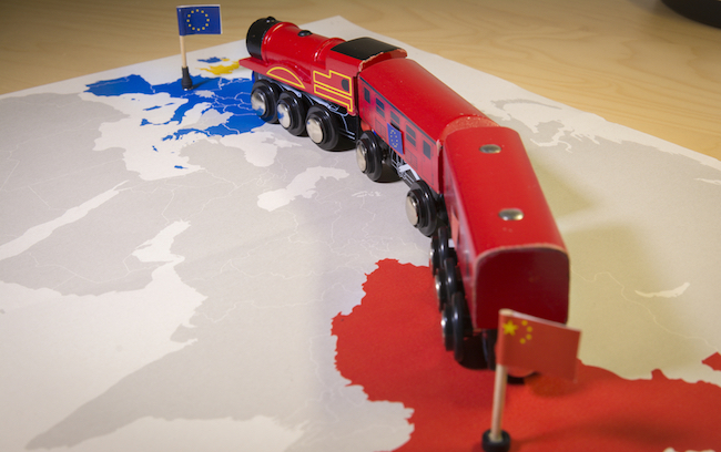 Toy,Train,Connecting,Europa,And,China.,Symbolizing,The,New,Silk