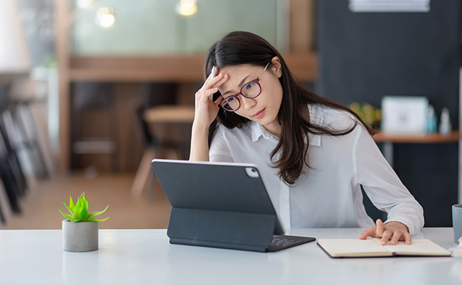 Image,Of,An,Asian,Woman,Who,Is,Tired,And,Overthinking