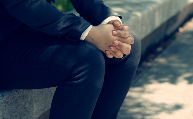 A,Business,Woman,Wearing,A,Mask,That,Drools,Outdoors