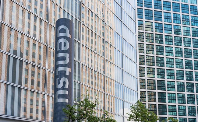 TOKYO, JAPAN - 23 July 2021：Dentsu Headquarters Building sign
