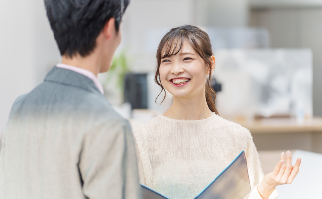 Young,Asian,Business,People,Talking,In,A,Office