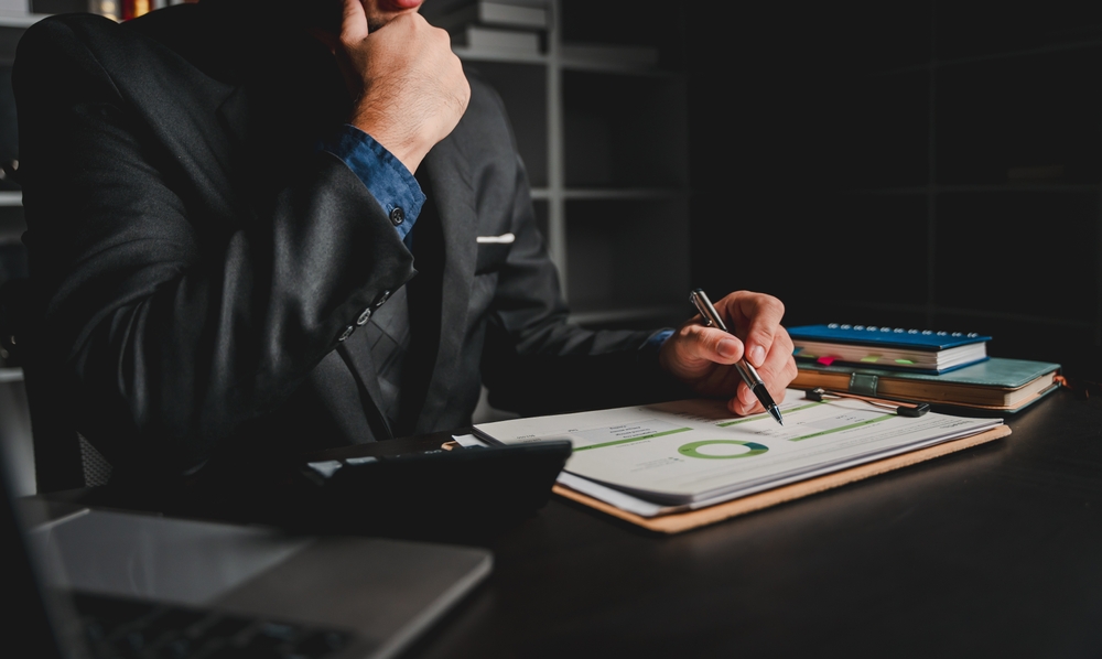 Portrait,Of,Man,Working,On,Tablet,Computer,In,Modern,Office