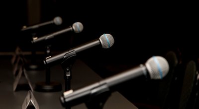 Microphones,In,Press,Conference,Room,,Prepared,For,Press,Conference.