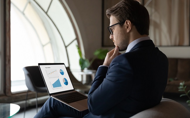 Side,Back,View,Focused,Skilled,Young,30s,Male,Marketing,Specialist