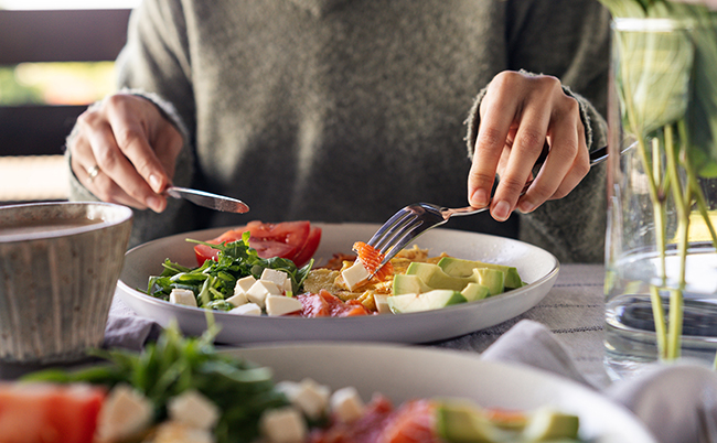 Woman,Eating,Healthy,Morning,Meal.,Healthy,Breakfast,With,Salmon,,Omelet,