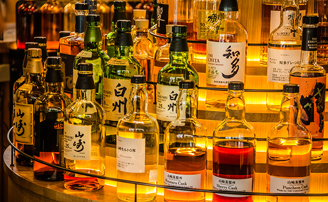 September,2019.,Showcase,With,Whiskey,Bottles,From,The,Yamazaki,Museum.