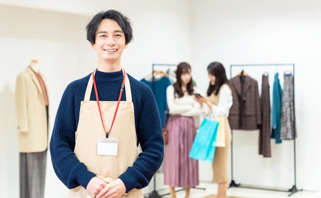 Young,Asian,Shop,Clerk,In,Apparel,Shop.