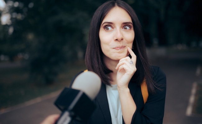 Tv,Journalist,Interviewing,A,Woman,On,The,Street.,Woman,Being