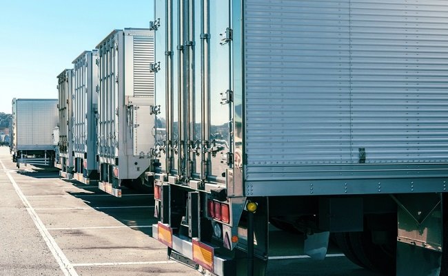 A,Truck,Trailer,Parked,In,The,Parking,Lot.