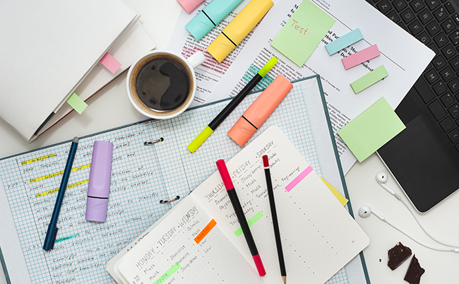 Student’s,Workspace.,Top,View,Of,The,Table,Filled,With,Notes,