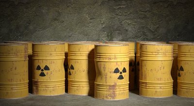 Yellow,Rusty,Steel,Barrel,With,Environmentally,Hazardous,Radioactive,Waste,Against