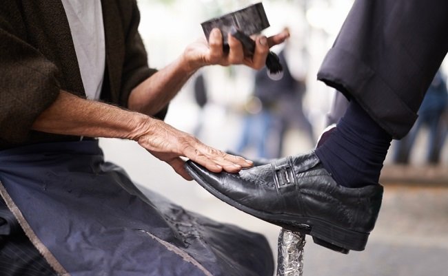 Keeping,The,Businessmens,Shoes,Shiney.,Cropped,Shot,Of,A,Shoe