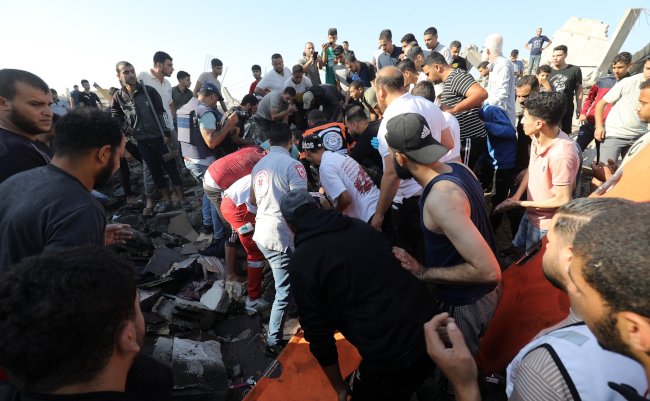 Palestinians,Evacuate,Wounded,After,An,Israeli,Airstrike,In,Rafah,Refugee