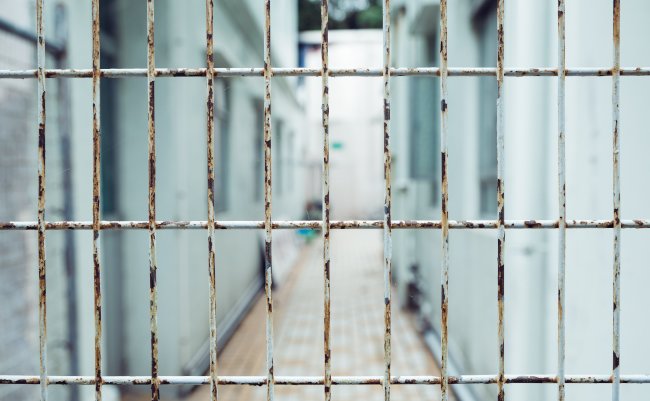 Iron,Bar,Fence,With,Old,Street