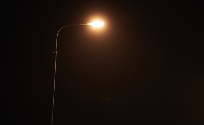 One,Night,Lamppost,Shines,With,Faint,Mysterious,Yellow,Light,Through