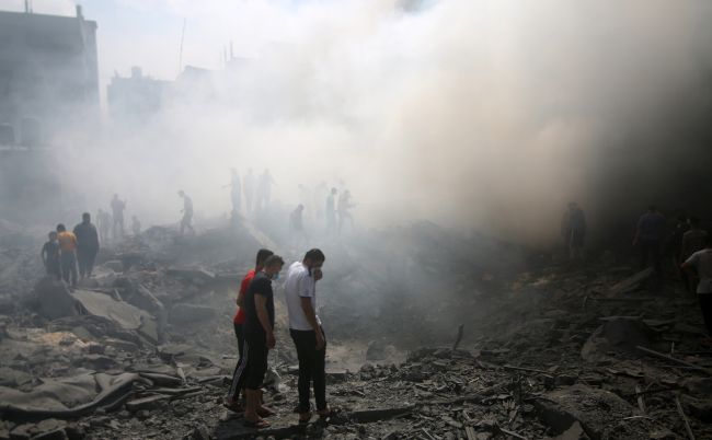 Palestinians,Look,For,Survivors,After,An,Israeli,Airstrike,In,Rafah