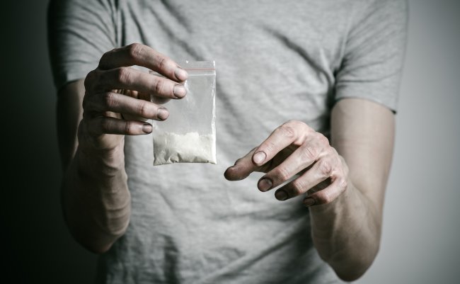 The,Fight,Against,Drugs,And,Drug,Addiction,Topic:,Addict,Holding