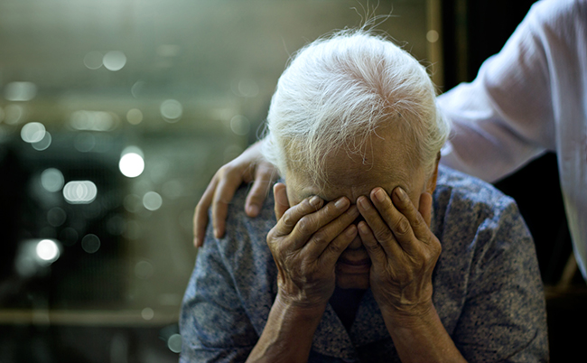 The,Daughter,Is,Comforting,An,Elderly,Woman,Who,Is,A