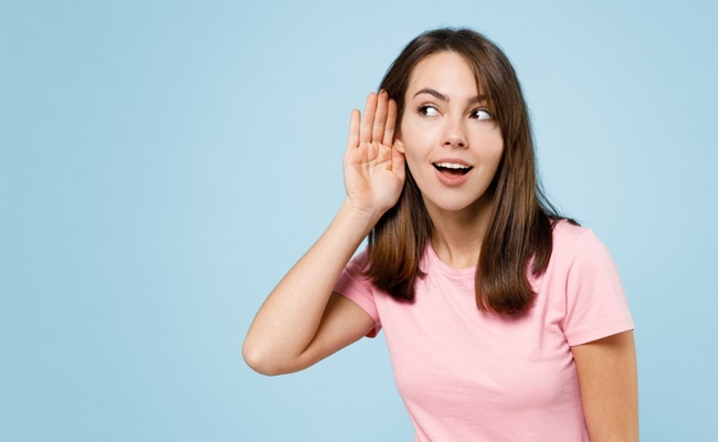Young,Curious,Nosy,Happy,Caucasian,Woman,20s,Wearing,Pink,T-shirt
