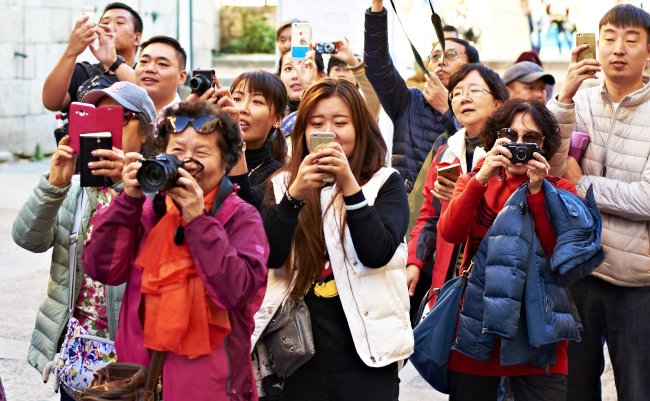 Segovia,,Spain,-,December,12th,2015:,Group,Of,Asian,Tourists
