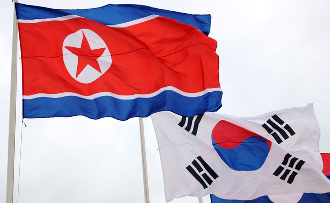 Waving,North,And,South,Korea,Flags