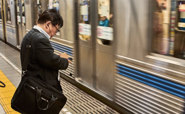 Tokyo,,Japan,-,October,19,,2017:,Businessman,Waiting,For,A