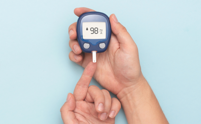 Man,Using,Glucometer,,Checking,Blood,Sugar,Level.,Diabetes,Concept,On