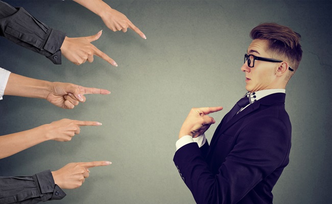 Blaming,You.,Anxious,Man,Judged,By,Different,People,Pointing,Fingers