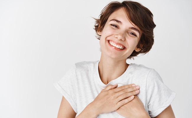 Close,Up,Of,Happy,Smiling,Woman,Say,Thank,You,,Holding