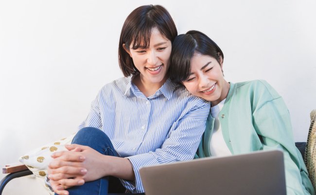 Two,Women,Looking,At,A,Computer,(women,,Couples,,Same,Surname,