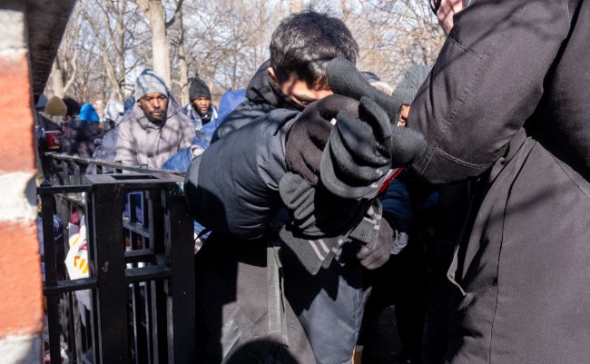 New,York,,Ny,,Usa,January,20,,2024:,Migrant,Holds,A