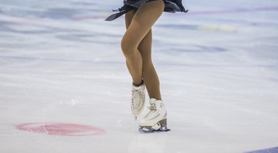 Slender,Legs,Of,Girl,Skater.,Competitions,In,Figure,Skating,,Performance