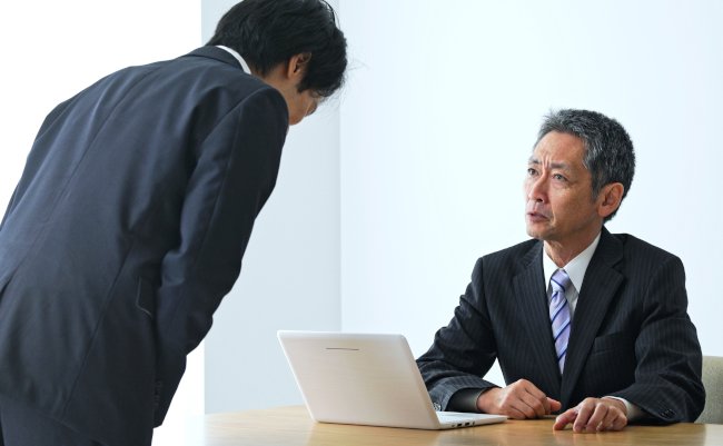 Scolding,Middle,Aged,Asian,Businessman,In,Office.