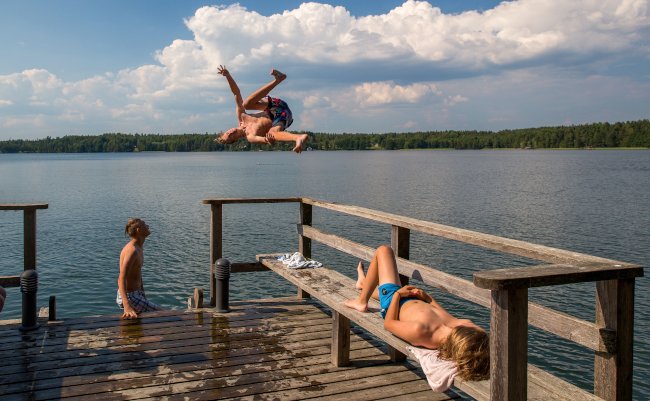 07-16-2018,Helsinki,,Finland.,Teenagers,Relax,And,Jumping,In,Water,On