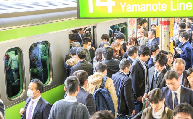 Tokyo,,Japan,-,April,17,,2017:,Crowd,Of,Commuters,Ascends