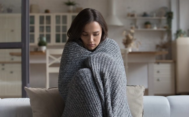 Stressed,Sad,Wrapped,In,Plaid,Young,Woman,Feeling,Cold,,Ill,