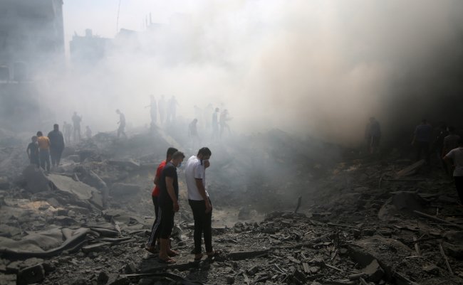 Palestinians,Look,For,Survivors,After,An,Israeli,Airstrike,In,Rafah
