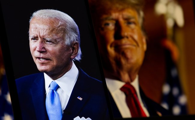 Democratic candidate Joe Biden is sharp in the foreground, while Republican candidate Donald Trump is blurred in the background, USA, December 16, 2024